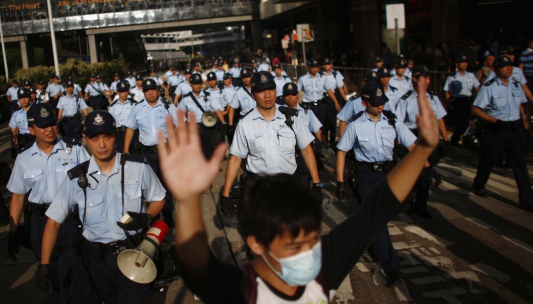 Studentføderasjonen i Hongkong har fått frist til mandag med å avslutte demonstrasjonene. FOTO: NTB scanpix Studentføderasjonen i Hongkong har fått frist til mandag med å avslutte demonstrasjonene. FOTO: NTB scanpix