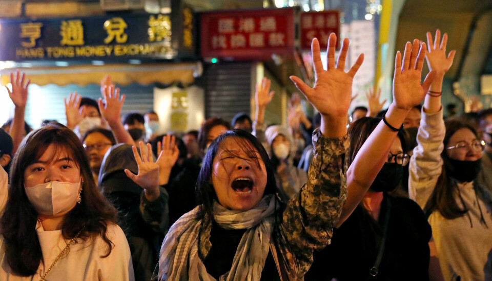 Protester utenfor Polytechnic University (PolyU) i Hongkong under protestene i november. Foto: Leah Millis/Reuters/NTB Scanpix