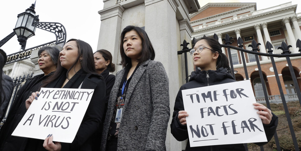 Det rapporteres om rasisme mot folk med asiatiske utseende i forbindelse med koronautbruddet. Bildet er fra en protest i regi av Asian American Commission i Boston 12. mars.