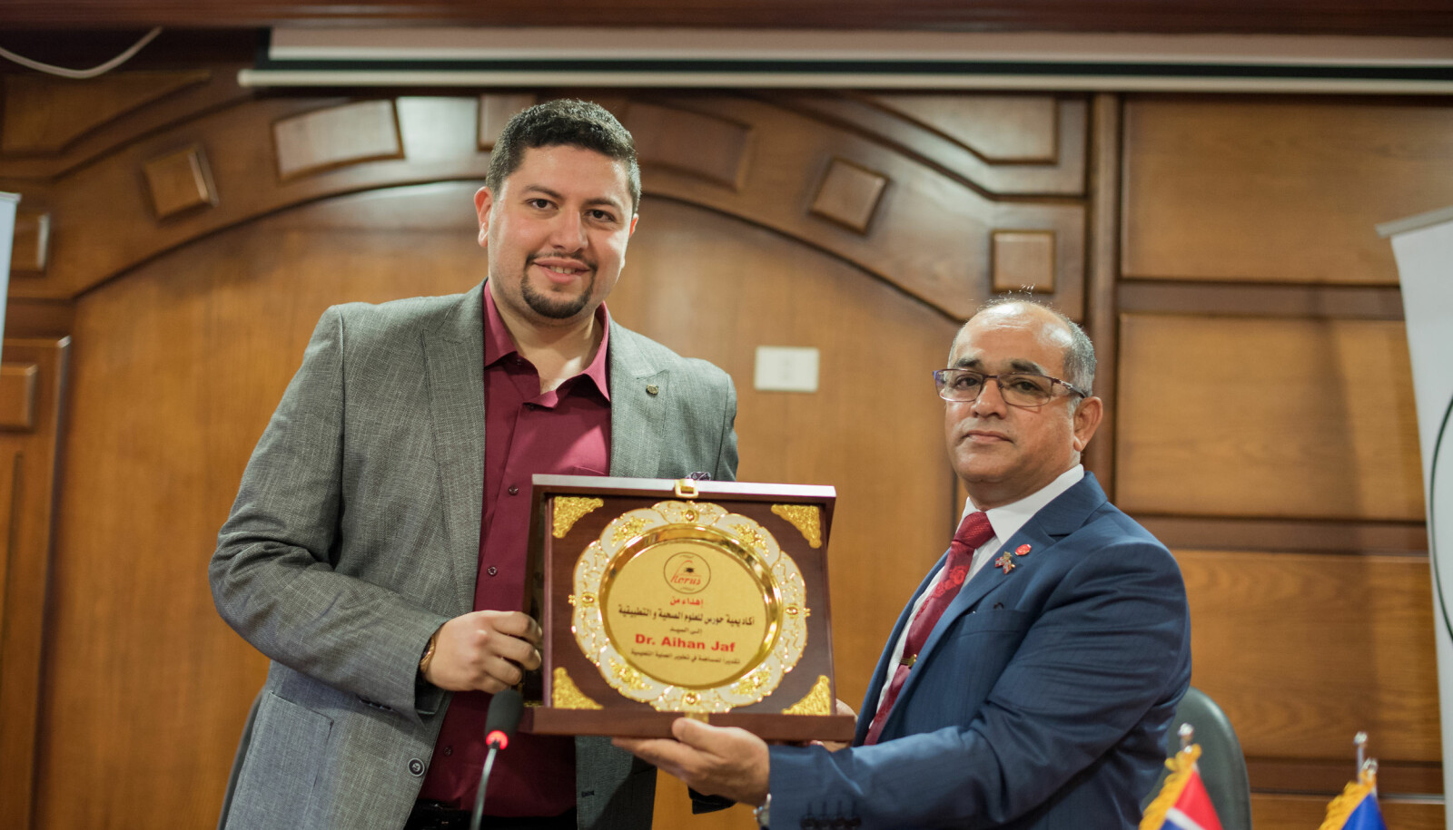 "Dr. Aihan Jaf" is written on the award Jaf receives back from the head of Horus Academy in Egypt.