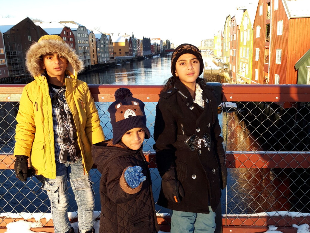 Ali, Ameer and Fatima standing at the Old Town Bridge in Trondheim. Ali, Ameer and Fatima standing at the Old Town Bridge in Trondheim.