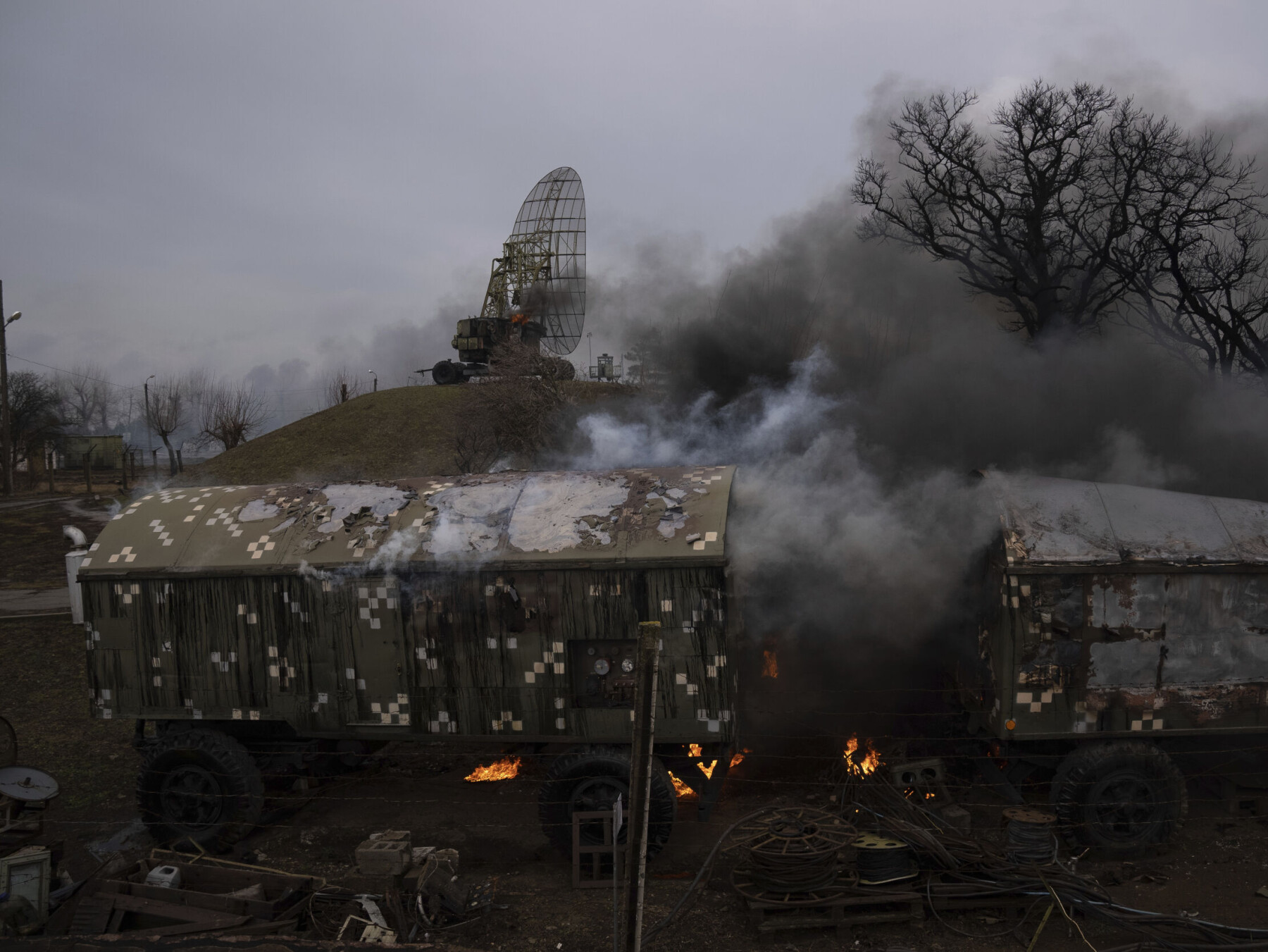 Smoke rise from an air defence base in the aftermath of an apparent Russian strike in Mariupol, Ukraine, Thursday, Feb. 24, 2022. Russian troops have launched their anticipated attack on Ukraine. Big explosions were heard before dawn in Kyiv, Kharkiv and Odesa as world leaders decried the start of Russian invasion that could cause massive casualties and topple Ukraine's democratically elected government. (AP Photo/Evgeniy Maloletka) Smoke rise from an air defence base in the aftermath of an apparent Russian strike in Mariupol, Ukraine, Thursday, Feb. 24, 2022. Russian troops have launched their anticipated attack on Ukraine. Big explosions were heard before dawn in Kyiv, Kharkiv and Odesa as world leaders decried the start of Russian invasion that could cause massive casualties and topple Ukraine's democratically elected government. (AP Photo/Evgeniy Maloletka)