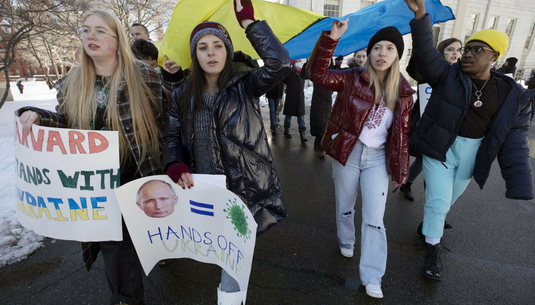 FILE - Harvard University student Nika Rudenko, second from right, marches on campus in support of Ukraine, Saturday, Feb. 26, 2022, in Cambridge, Mass. (AP Photo/Michael Dwyer, File) FILE - Harvard University student Nika Rudenko, second from right, marches on campus in support of Ukraine, Saturday, Feb. 26, 2022, in Cambridge, Mass. (AP Photo/Michael Dwyer, File)