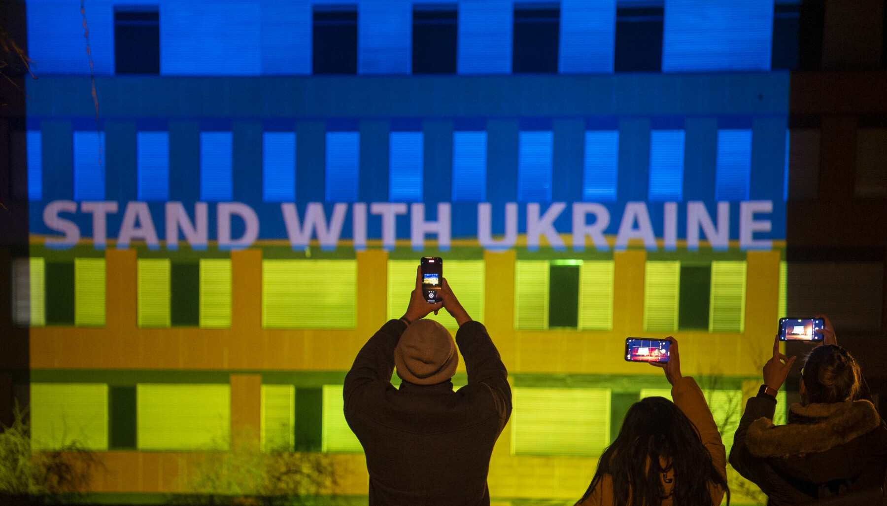 Inscription Stand with Ukraine illuminates on the building of the University of South Bohemia in Ceske Budejovice, Czech Republic, March 3, 2022. (CTK Photo/Vaclav Pancer)