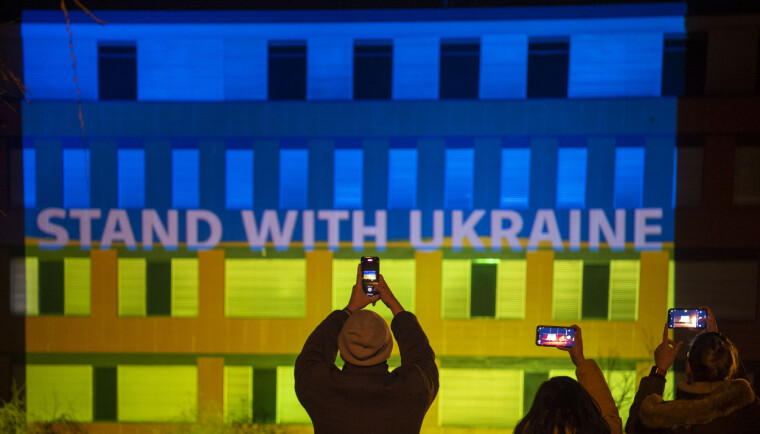 Inscription Stand with Ukraine illuminates on the building of the University of South Bohemia in Ceske Budejovice, Czech Republic, March 3, 2022. (CTK Photo/Vaclav Pancer)