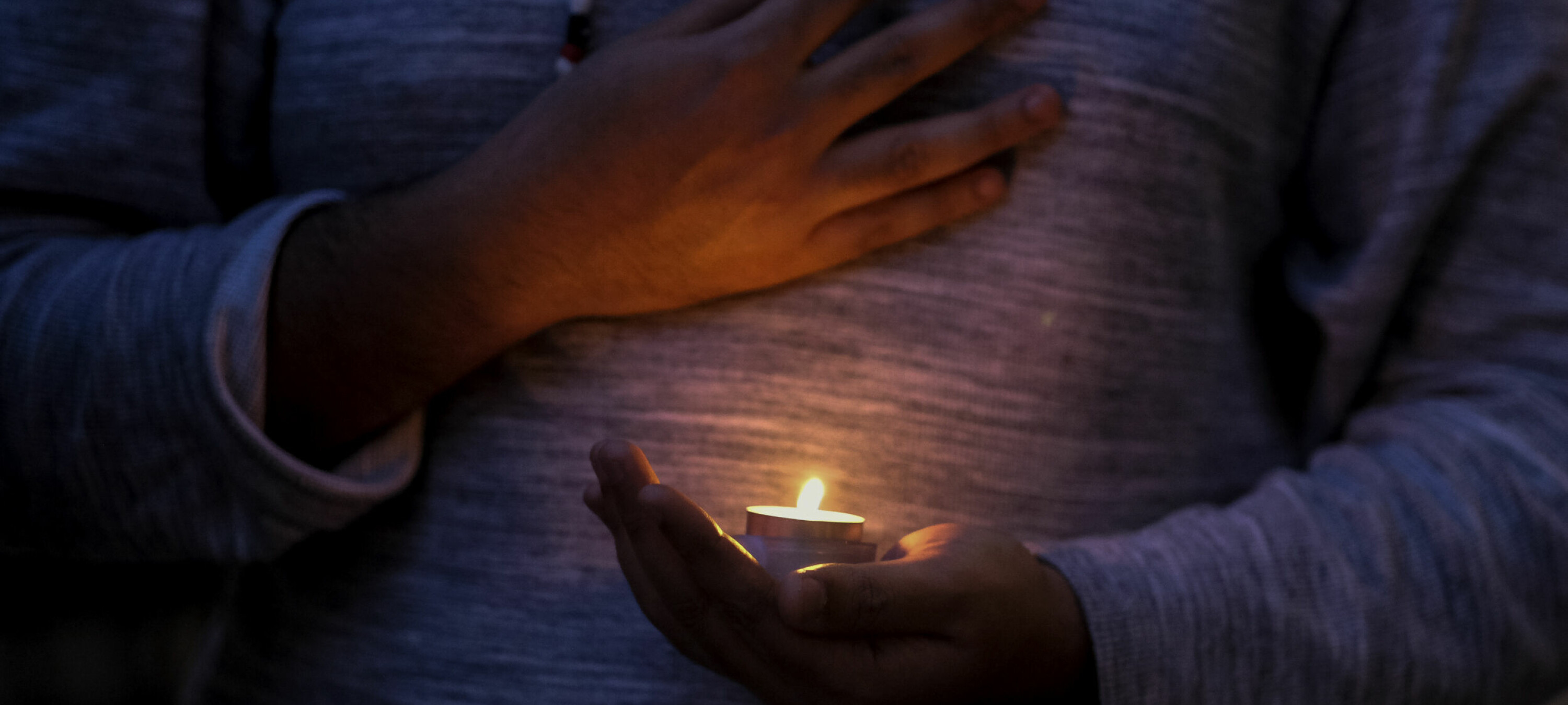 March 1, 2022, Los Angeles, California, USA: A student holds a candlelight during a vigil in support of Ukraine at University of Southern California in Los Angeles on March 1, 2022.