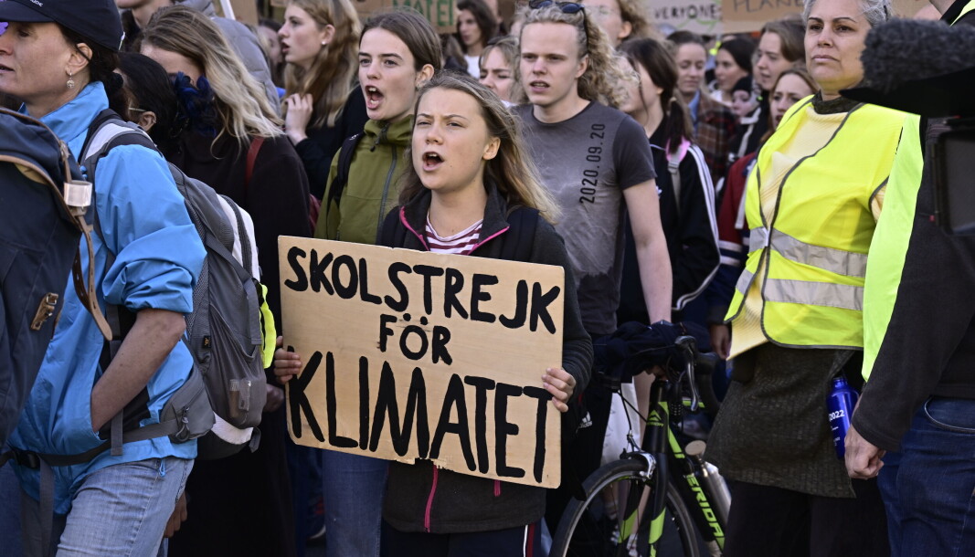 Greta Thunberg, her fra en klimademonstrasjon i Stockholm 9. september, sa i sin tale til World Economic Forum i 2019 at hun ville at de skulle opptre som de ville ha gjort i en krise. Greta Thunberg, her fra en klimademonstrasjon i Stockholm 9. september, sa i sin tale til World Economic Forum i 2019 at hun ville at de skulle opptre som de ville ha gjort i en krise.