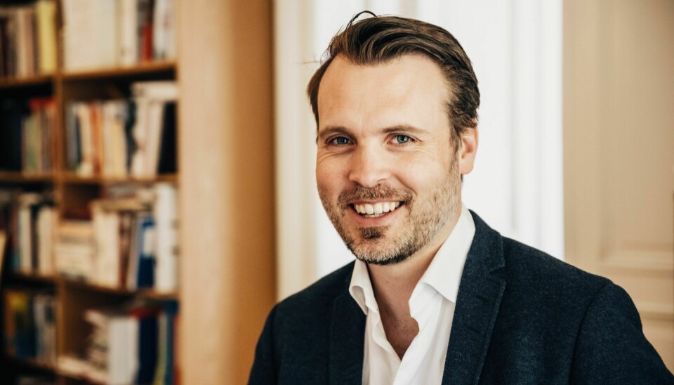 Arne Vestbø, generalsekretær i Norsk faglitterær forfatter- og oversetterforening, smiler
