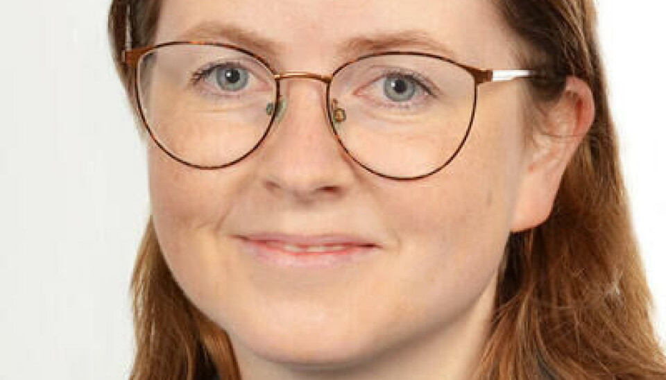 Marte Emilie Sandvik Haaland Ung kvinne med halvlangt kastanjebrunt hår. Hun har store briller og smiler. Har grønn skjorte på seg.