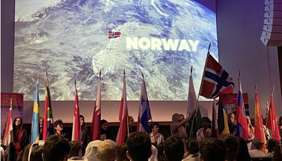 Internasjonal konkurranse med norsk flagg og Norway på skjermen.
