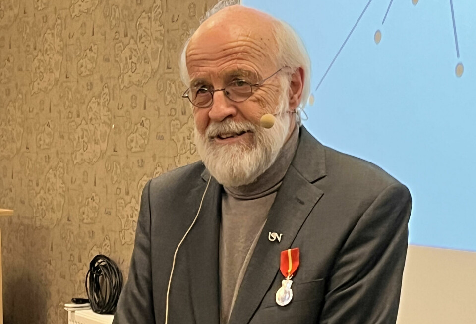 Petter Aasen med Kongens fortjenstmedalje