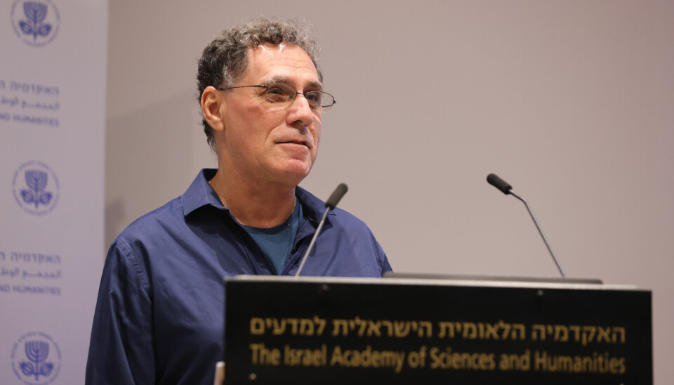 Professor Motti Segev på talerstol