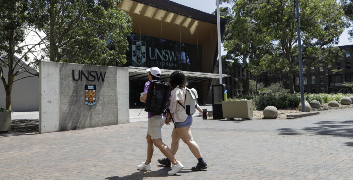 Students walk around the University of New South Wales campus in Sydney, Australia, Tuesday, Dec. 1, 2020. Australia has welcomed its first group of international students to arrive since the coronavirus pandemic began, with a charter flight carrying students from mainland China, Hong Kong, Japan, Vietnam and Indonesia landed Monday in the northern city of Darwin. (AP Photo/Mark Baker)
